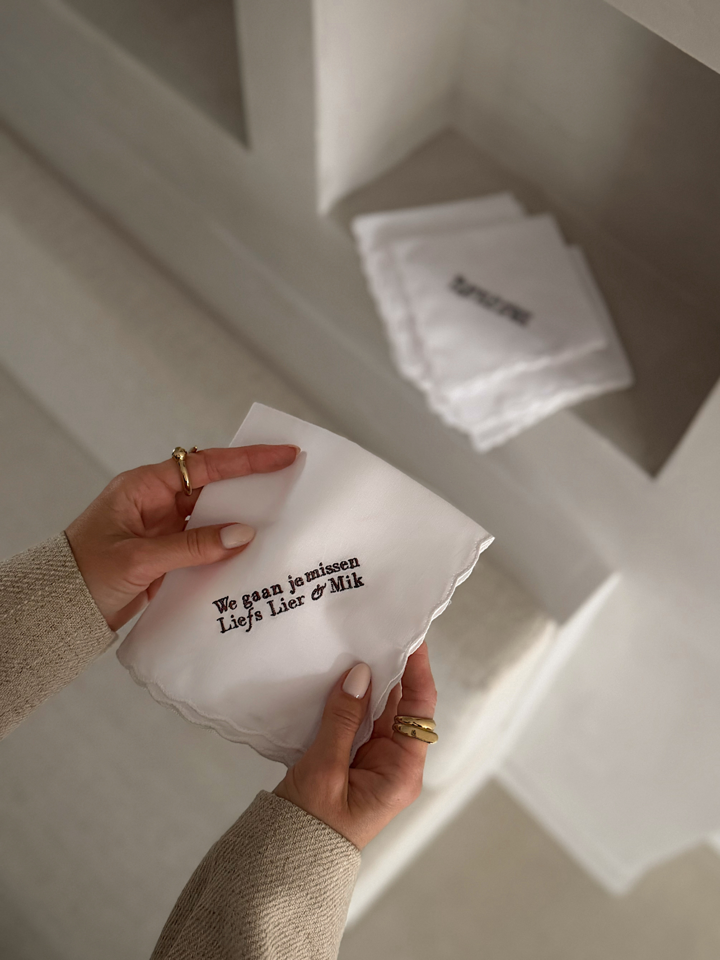 Handkerchief with an elegant dark brown initial.